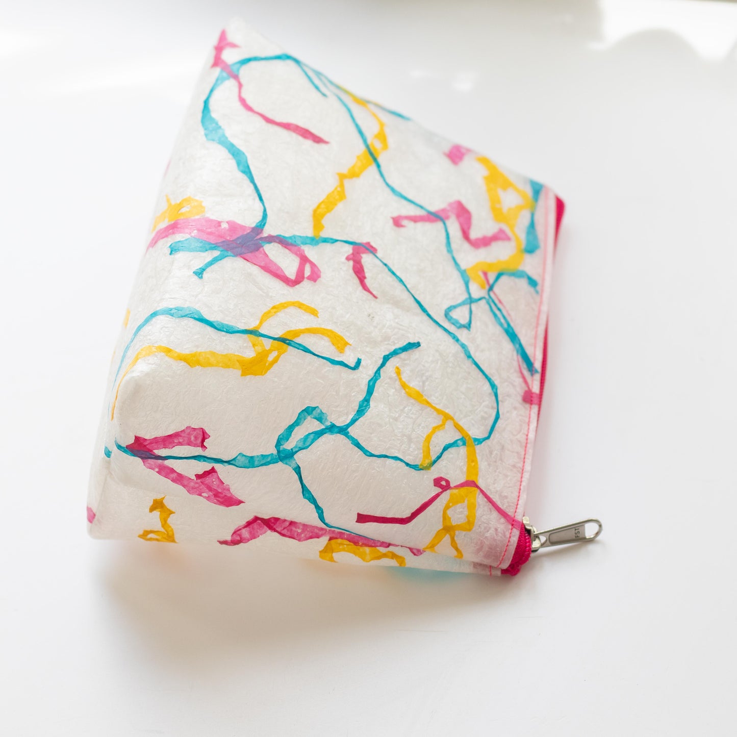 Water-resistant upcycled plastic make-up bag | Colour pop squiggle