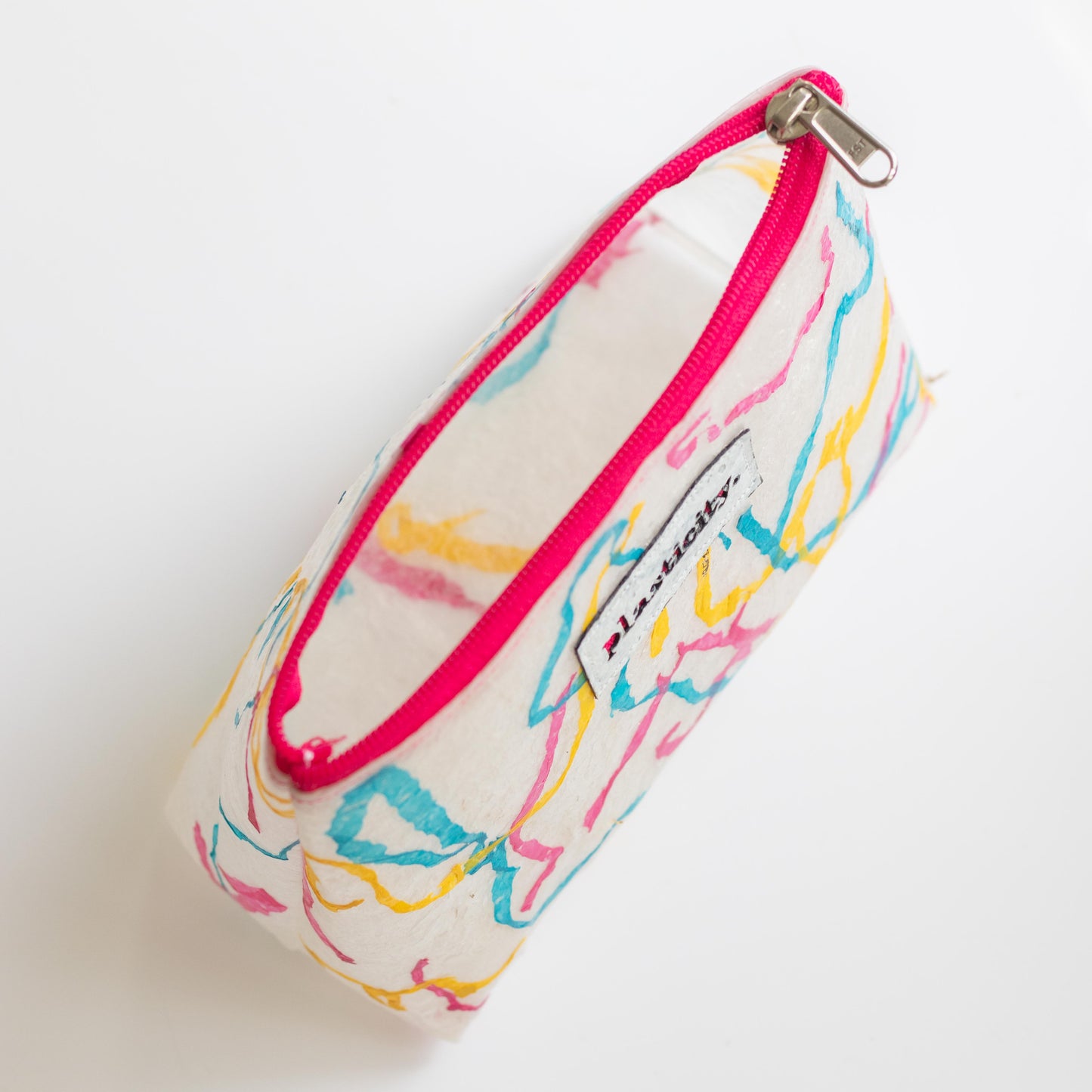 Water-resistant upcycled plastic make-up bag | Colour pop squiggle